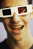 Portrait+of+a+teenage+boy+wearing+3-D+glasses