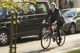 Young+man+riding+a+bicycle