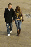 Teenage+boy+and+a+teenage+girl+walking+on+the+road