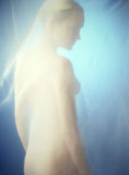 Naked+young+woman+behind+a+curtain