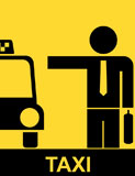 Vector+illustration+of+a+yellow+road+sign+-+Taxi.