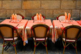 Outdoor+restaurant+patio+on+medieval+street+of+Sarlat%2C+Dordogne+region%2C+France
