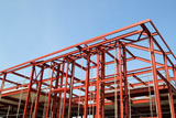 Red+steel+building+construction+framework.