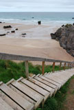 wooden+stairs+to+a+rocky+beach+in+northern+Scotland+