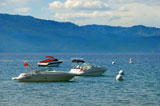 Three+speedboats+on+lake+Tahoe+in+California+