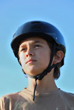 Portrait+of+a+boy+wearing+a+skateboard+helmet+