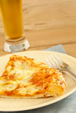 Hot+pizza+on+the+plate+with+cold+beer+