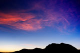 high+mountain+silhouette+with+beautiful+colorful+clouds.+