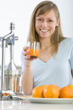 Woman+with+assorted+citrus+fruits+and+orange+juice%2C+isolated+