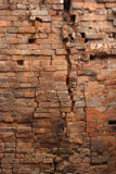 Very+old+background+image+of+a+brick+wall+that+is+falling+apart.+