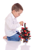 Cute+little+boy+with+a+christmas+tree+