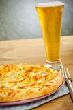 Hot+pizza+on+the+plate+with+cold+beer+