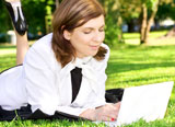 picture+of+office+lady+with+laptop+computer+laying+on+the+grass+