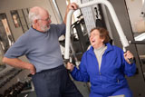 Senior+Adult+Couple+Working+Out+in+the+Gym.