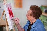 Old+woman+paints+a+picture+