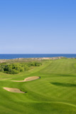 Golf+course+green+grass%2C+sea+ocean+and+summer+blue+sky+++++++++++