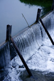 Blue+litter+river+waterfall+detail+vertical+image+shot