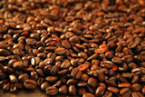 Coffee+beans+in+warm+golden+brown+pattern+background+texture
