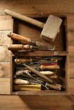 carpenter+artist+wooden+craftman+toolbox+over+wood+background
