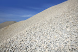 gravel+gray+mound+quarry+stock+blue+sky+rolling+stones