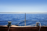 sailboat+winches+wooden+board+blue+sea+horizon+summer+vacation