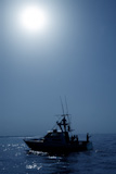Backlight+on+blue+water+sport+fishing+boat