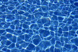 Blue+water+texture%2C+tiles+pool+in+sunny+day+with+light+reflections
