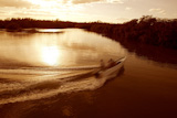 Boat+ship+wake+prop+wash+curve+on+sunset+lake+river