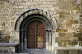 Ancient+stone+arch+romanic+architecture+church+in+Spain+Pyrenees