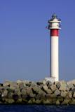 Lighthouse+over+blue+sky+in+Huelva+Atlantic+ocean+Spain