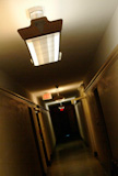 Lights+above+a+dark+hallway.