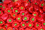 Red+pepper+stacked+in+market+as+pattern+background+vegetables
