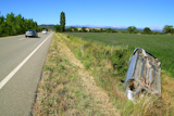 Car+crash+accident+upside+down+vehicle+off+the+road+green+landscape