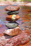 Rolling+stones+stacked+red+rodeno+limestone+in+river+Pyrenees