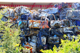 scrap+metal+scrap-iron+junk+outdoor+stacked+rows