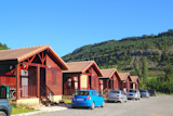 Wooden+bungalow+houses+in+camping+area+in+Pyrenees+mountains