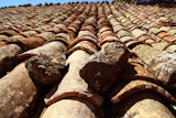 clay+roof+tiles+old+aged+arabic+style+in+Spain+perspective