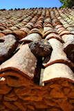 clay+roof+tiles+old+aged+arabic+style+in+Spain+perspective