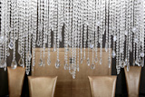 dining+room+modern+crystal+strass+lamp+and+crocodile+golden+chairs