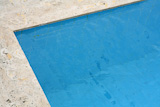 corner+of+the+swimming+pool+with+blue+water