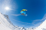 Snowboarder+launching+off+a+jump%3B+Gressoney+%2C+Aosta%2C+Italy.