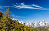 Mountain+landscape%3A+larch+forest+over+high+mountain+peak+%28Mont+Blanc+massif%2C+italian+Alps%29%2C+fall+season.