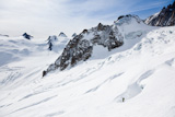 Male+skier+moving+down+in+snow+powder%3B+envers+du+plan%2C+vall%3F%C2%A8e+blanche%2C+Chamonix%2C+Mont+Blanc+massif%2C+France%2C+Europe.+