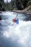Kayaking+Rough+Rapids+In+A+Mountain+River