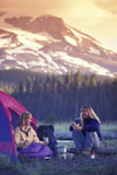 Caucasian+Women+Camping+Together+Under+A+Mountainous+Peak