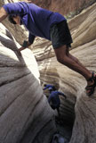Hikers+Scaling+A+Rock+Crevice