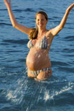 Pregnant+Woman+Splashing+in+Water