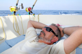 Sailor+senior+fisherman+relax+on+boat+fishing+deep+sea