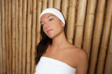 bamboo+spa+woman+sitting+relaxed+after+massage+treatment