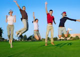 happy+jump+group+of+young+people+jumping+outdoors+grass